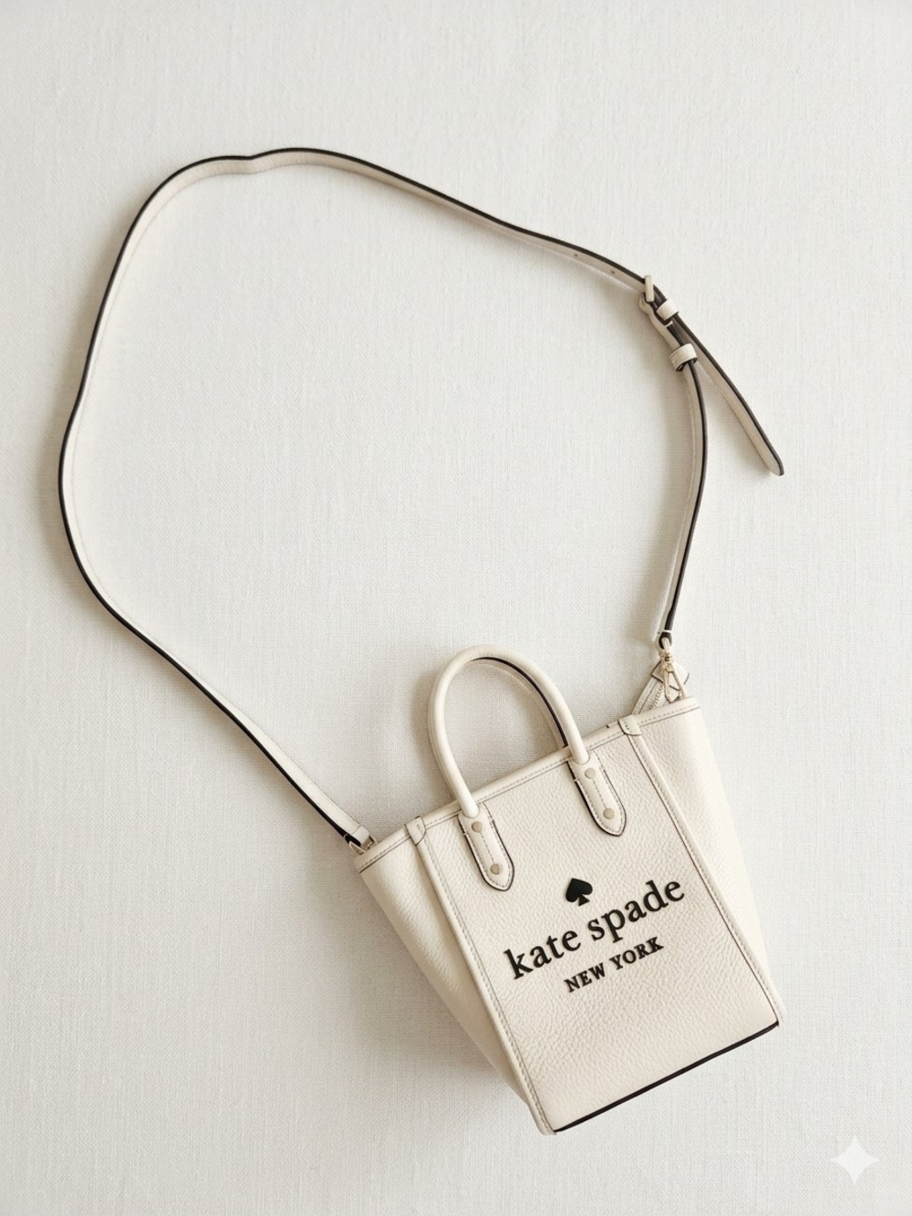 kate spade Cream Mini Convertible Crossbody Tote with Black Logo